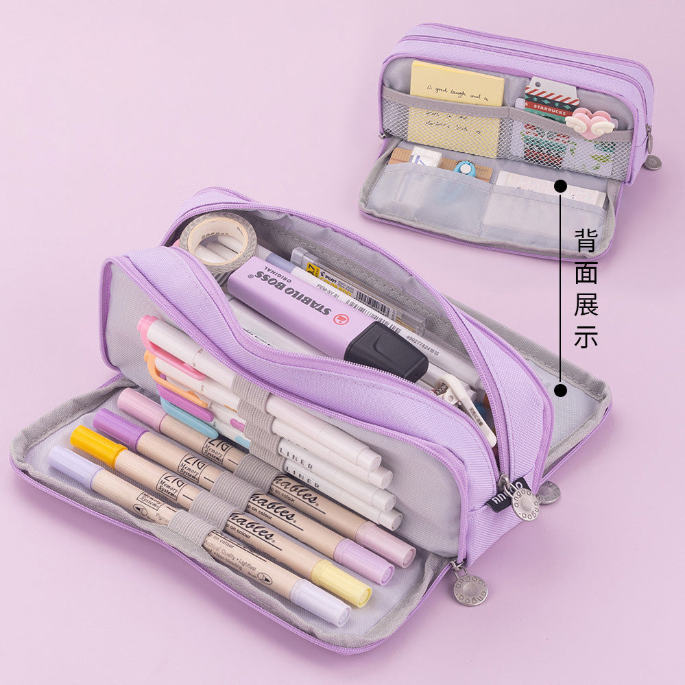 Multiple styles of minimalist solid-colored candy-colored large capacity stationery cases, creative student multi-functional canvas pencil cases that are washable.