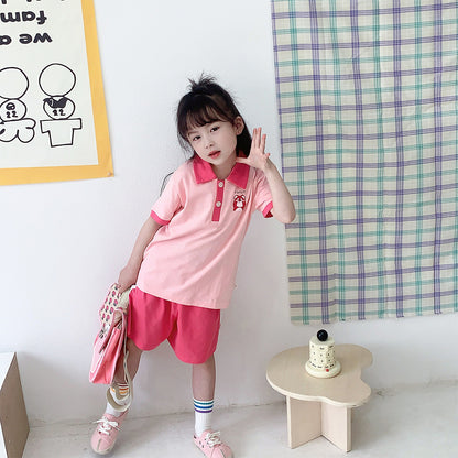 Boys' and girls' fashionable two-piece set, trendy and cute polo collar short sleeve suit for the 2023 summer season.